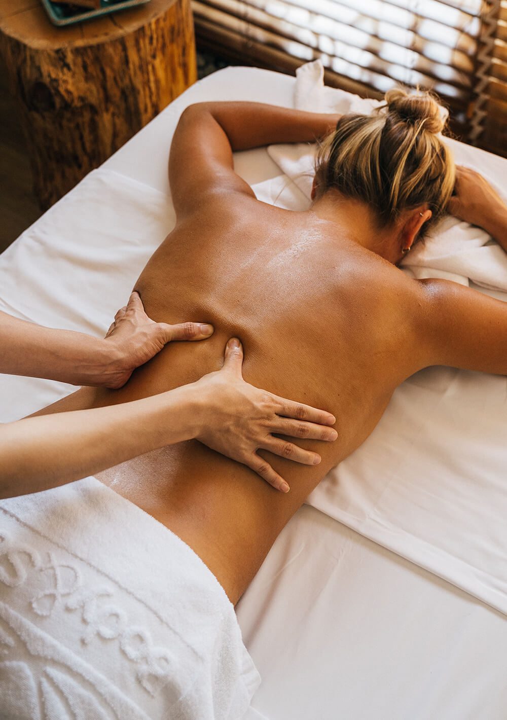 massage therapist performing a chronic pain massage